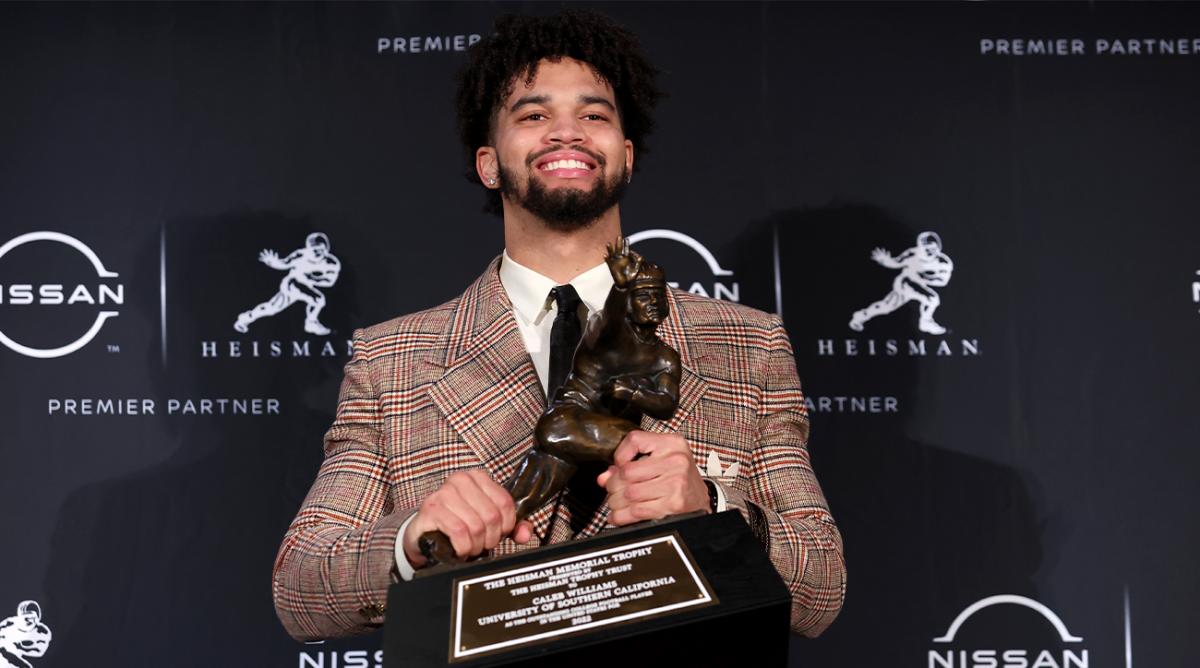 Dec 10, 2022; New York, NY, USA; Southern California quarterback Caleb Williams poses for photos during a press conference in the Astor Ballroom at the New York Marriott Marquis in New York, NY, after winning the 2022 Heisman Trophy.